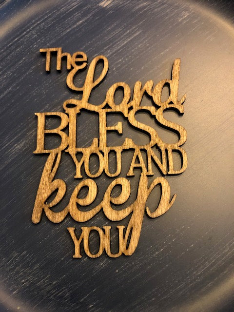 "Bless & Keep", Welded sayings