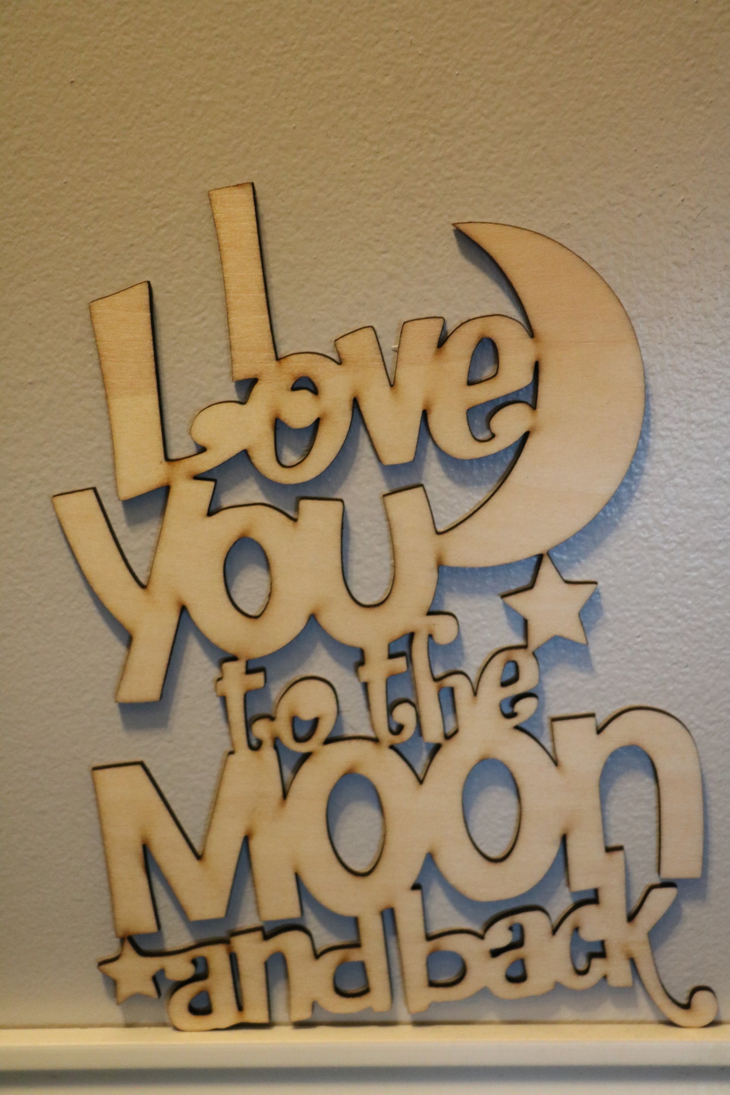 "To The Moon", Welded saying